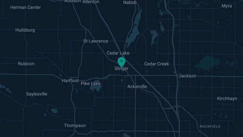 Map of Slinger, Wisconsin: 2 documented asbestos exposure sites